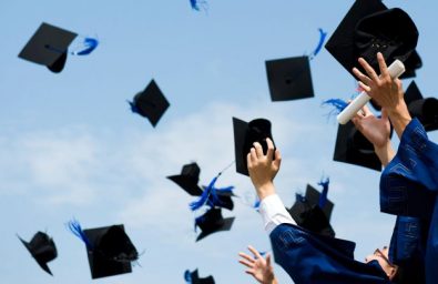 graduation-caps-in-air graduation-caps-in-air